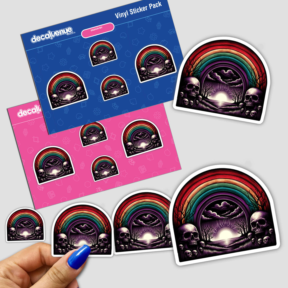 Macabre Rainbow Over Skulls Sticker - Vibrant digital artwork featuring a nighttime landscape with skulls and a colorful rainbow against a dark sky, perfect for expressing your unique style.