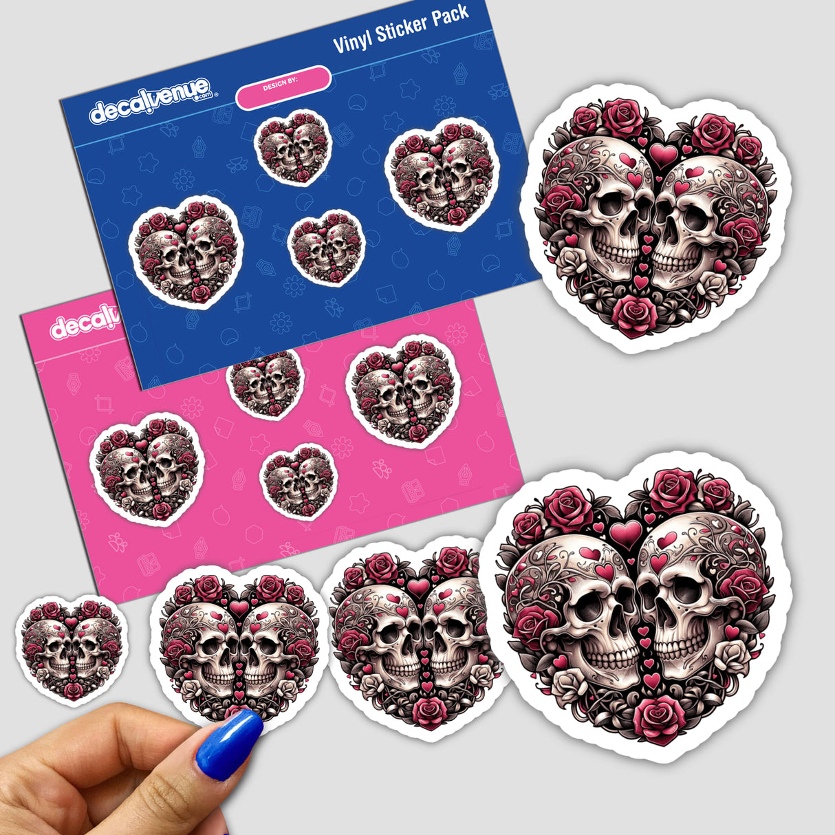 Colorful, detailed stickers featuring skull designs surrounded by roses, hearts, and other floral elements. The stickers are part of a "Vinyl Sticker Pack" from the Decal Venue store, showcasing their unique and visually striking digital artwork products.