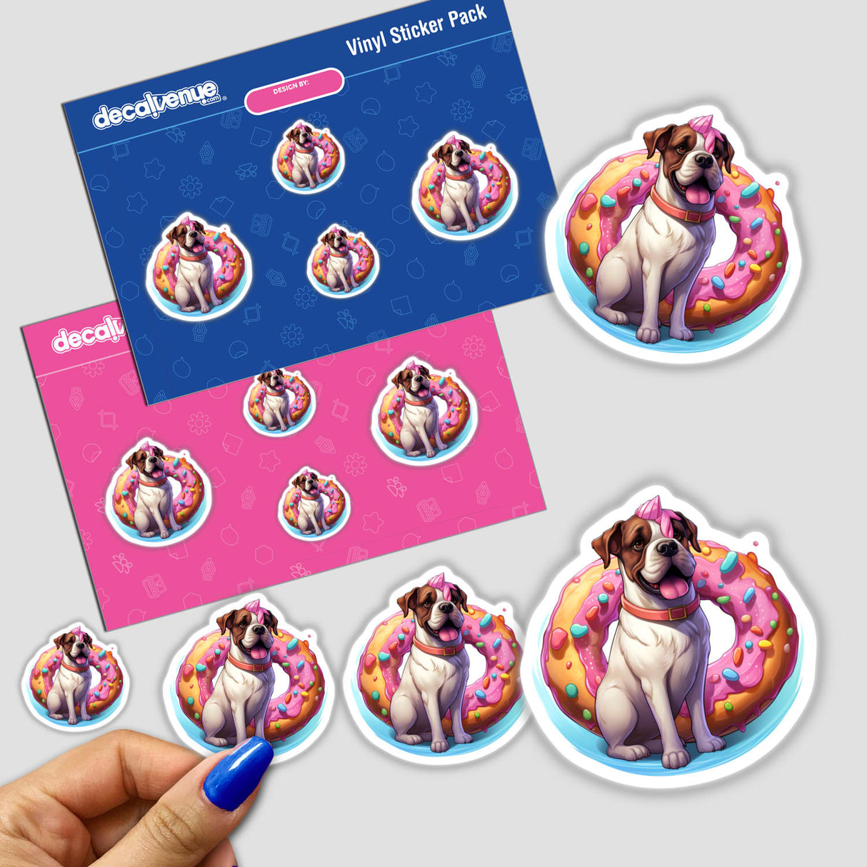 Colorful vinyl stickers featuring a dog wearing a unicorn horn, surrounded by donuts. The stickers are displayed on a product package from Decal Venue, an online store that offers unique stickers and digital art.